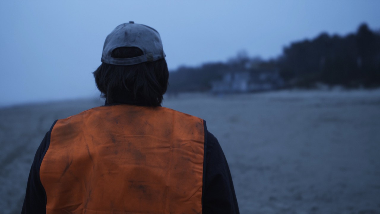 The Man in the Orange Jacket