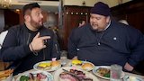 Adam Richman Eats the Two Most Iconic Burgers in NYC